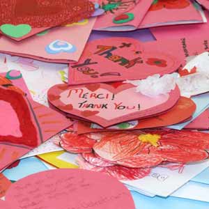 homemade valentines that say Merci and Thank You