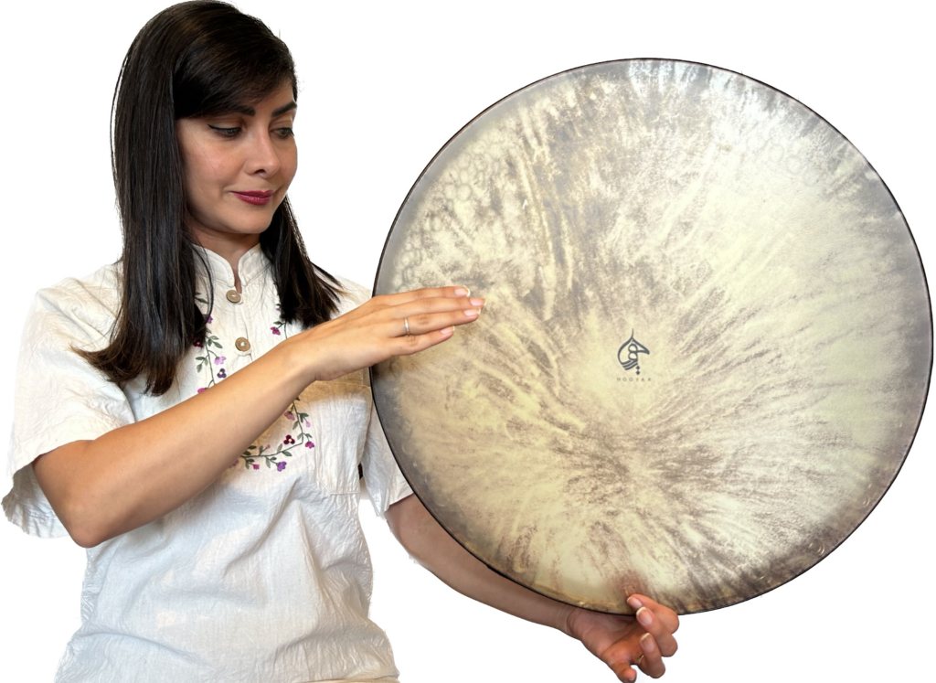 A woman holding a Persian Daf Drum.