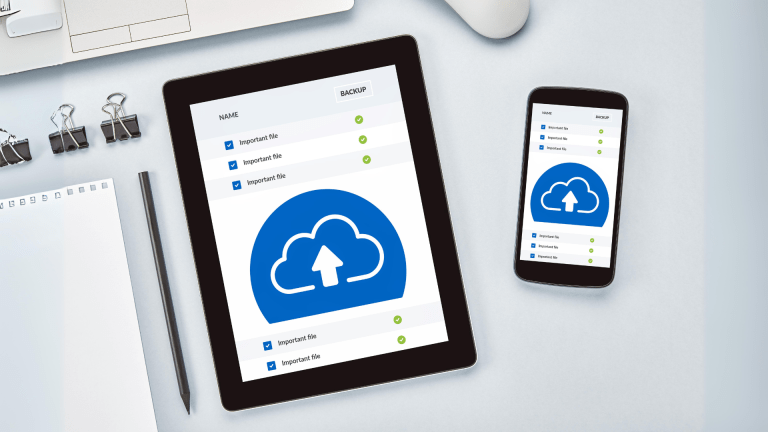 Tablet and cell phone displaying a generic cloud storage interface.