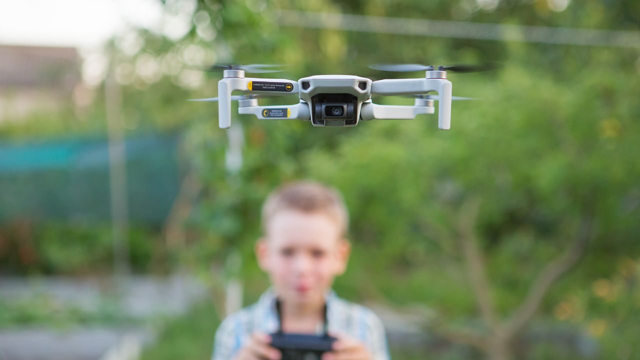 Kid flying drone