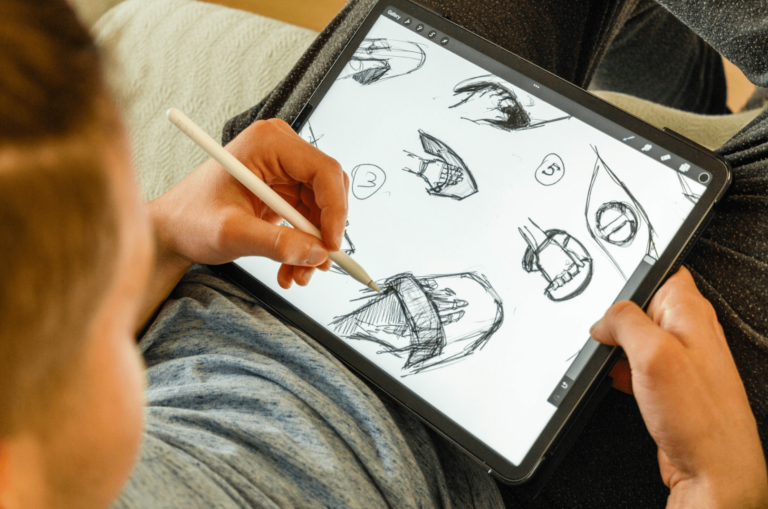 A child sketching on an iPad