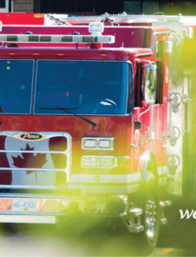 Red fire truck with a west Vancouver logo