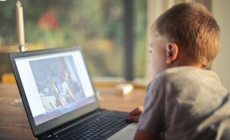 boy-watching-video-using-laptop-821948